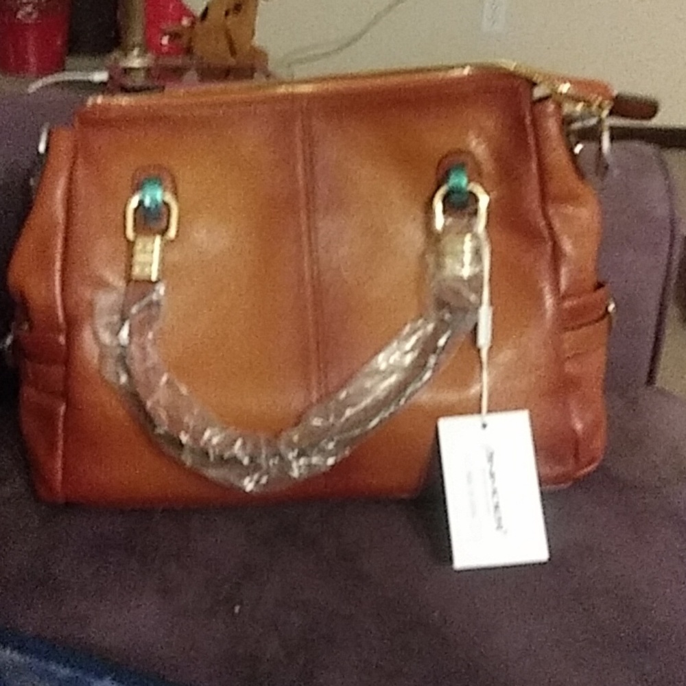 Ainimoer NWT. Genuine leather bag